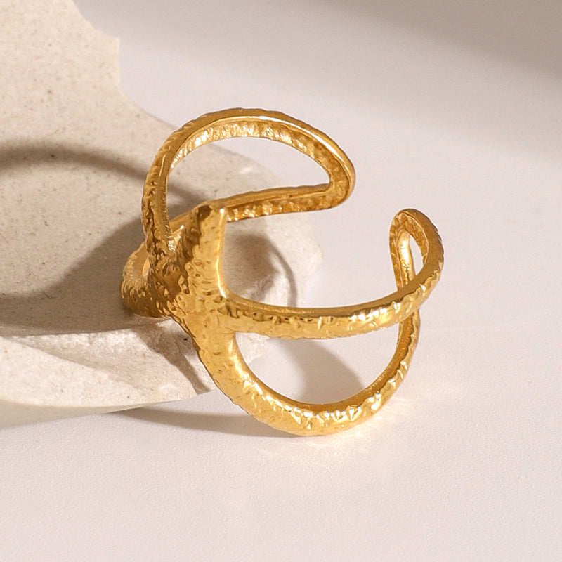 Anillo abierto de estrella de mar de acero inoxidable