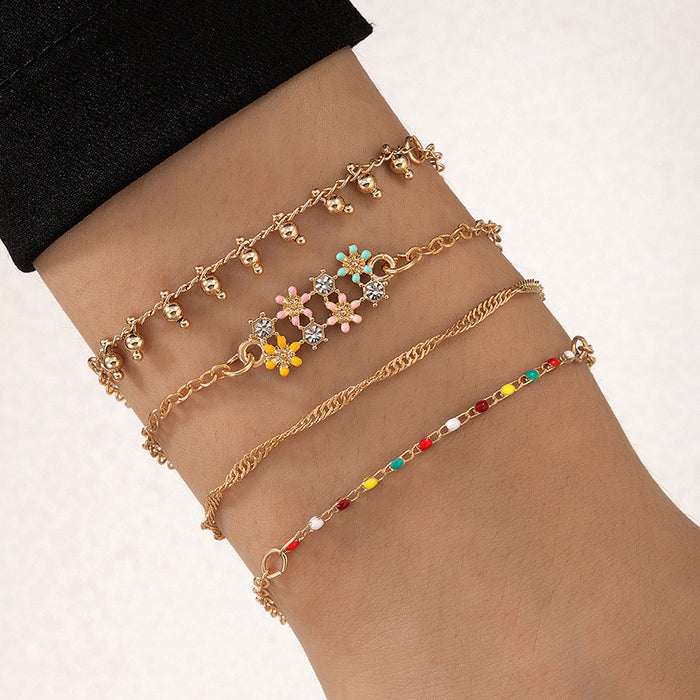 Sweet Flower Tassel Bracelet Set - Colorful Floral Drip Oil Four-Piece Collection