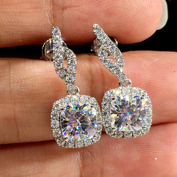 Pendientes de circonitas cuadradas con diamantes