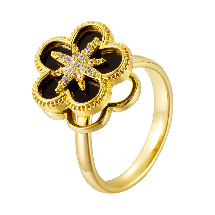 Wholesale black eight-pointed star five-petal flower rotating open ring