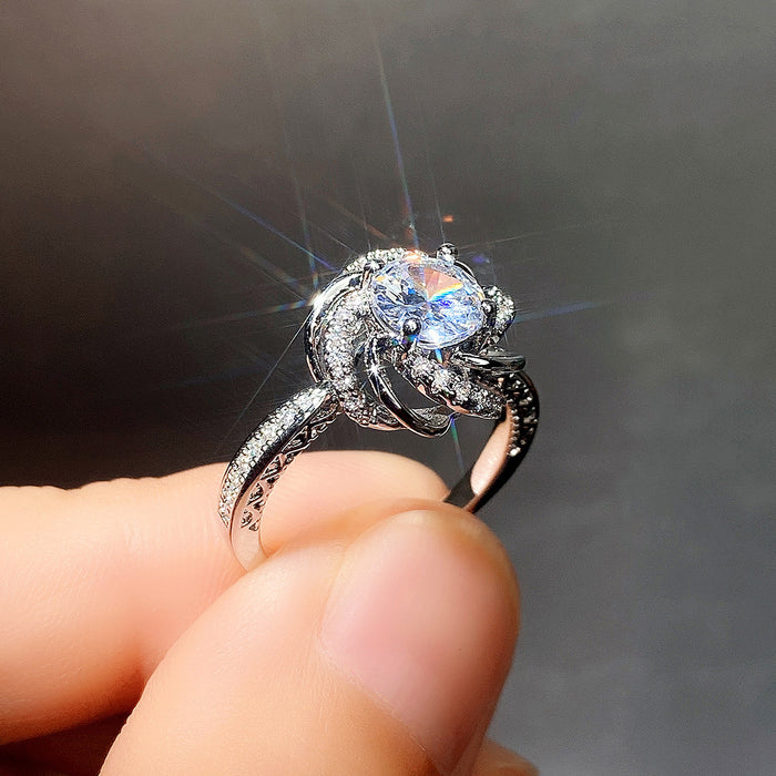 Anillo de boda de diseño exquisito con circonita y capullo de rosa