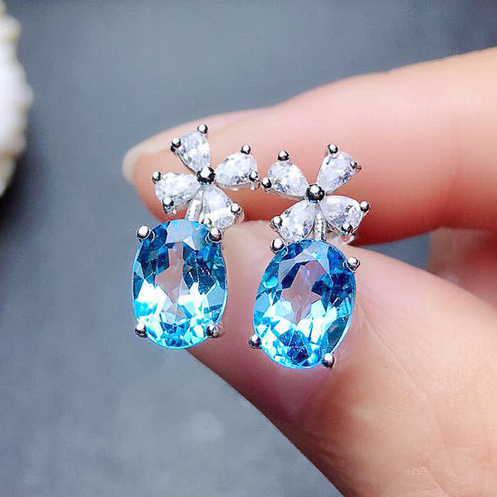 Micro-paved aquamarine zircon earrings and copper-plated white gold stud earrings