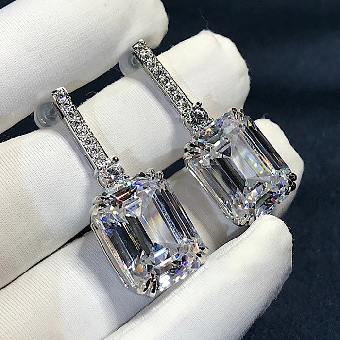 Pendientes de circonitas y diamantes para eventos empresariales