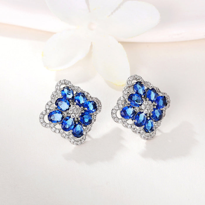 Blue enchantress flower earrings