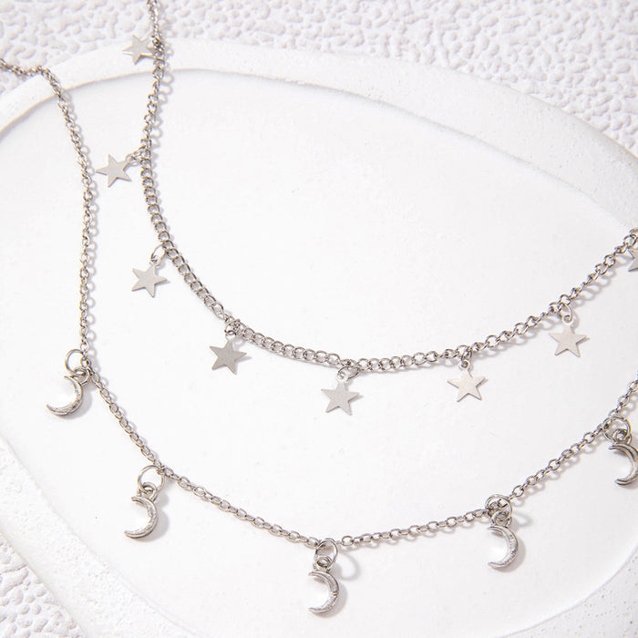 Collar con colgante de borlas de estrellas y lunas con capas creativas