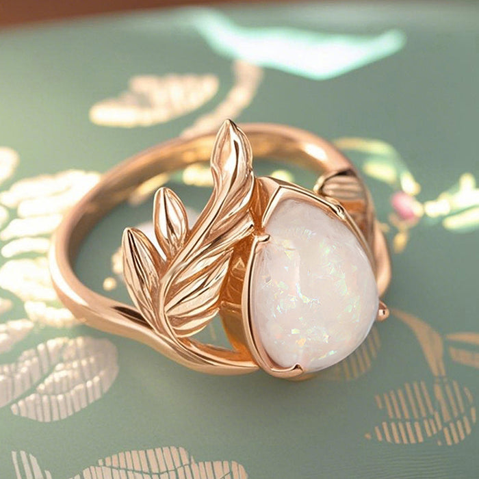 Women's Baroque ring with water drop imitation opal leaf and branch