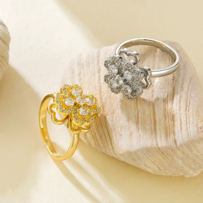 Wholesale micro-painted zircon and pearl four-leaf clover rotating open ring