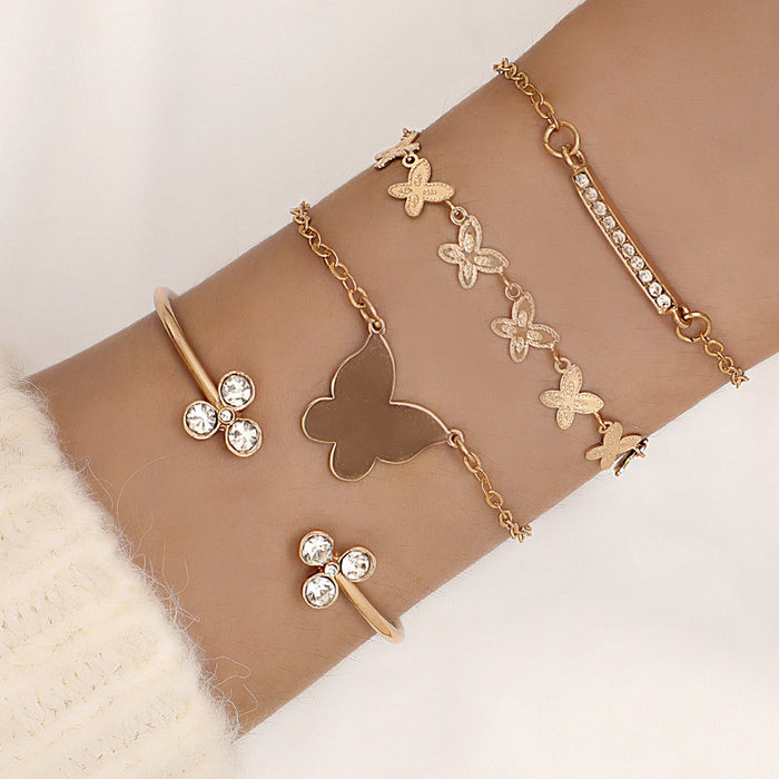 Juego de pulseras con diamantes de imitación y mariposas en capas: joyería elegante para mujer