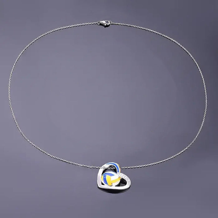 Collar deportivo con dije de voleibol en forma de corazón
