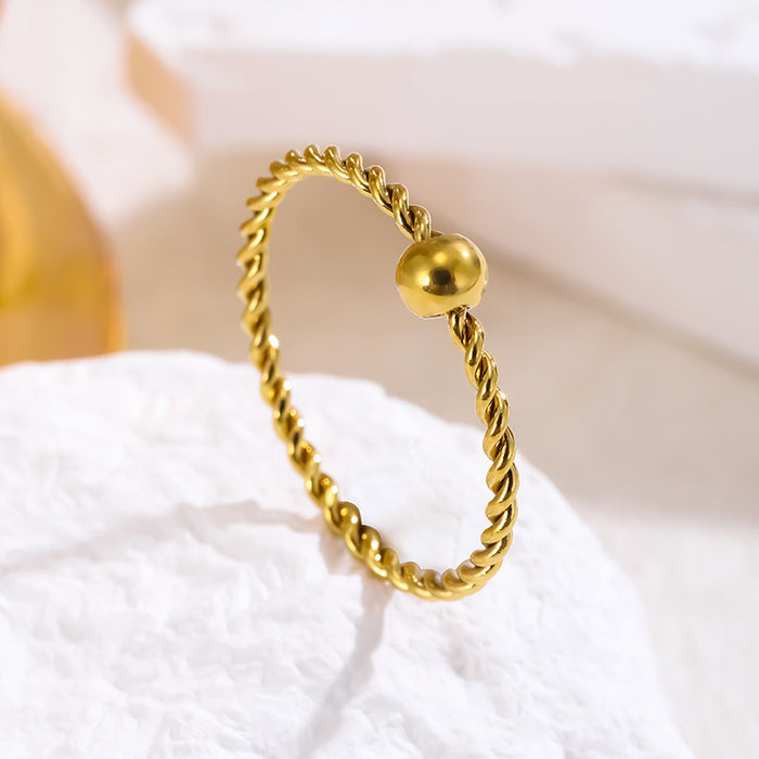 Wholesale colorfast stainless steel and titanium steel gold bean twist rings