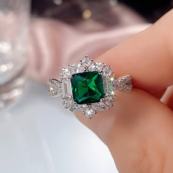 Anillo de compromiso de moda con diamantes de princesa esmeralda