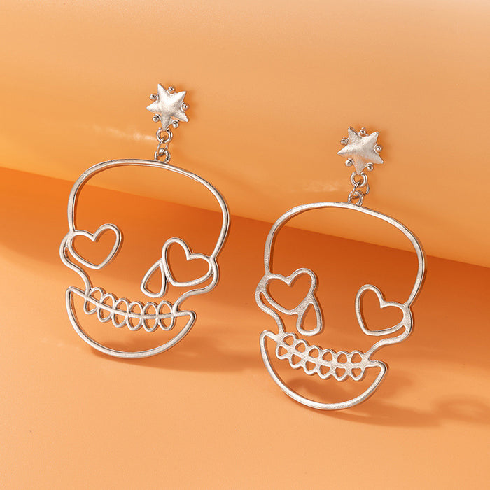 Funny Halloween golden skull face earrings