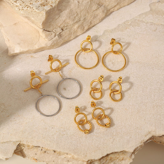 Pendientes colgantes redondos huecos de acero inoxidable en oro de 18 quilates de estilo europeo: joyería de acero de titanio de moda para mujeres