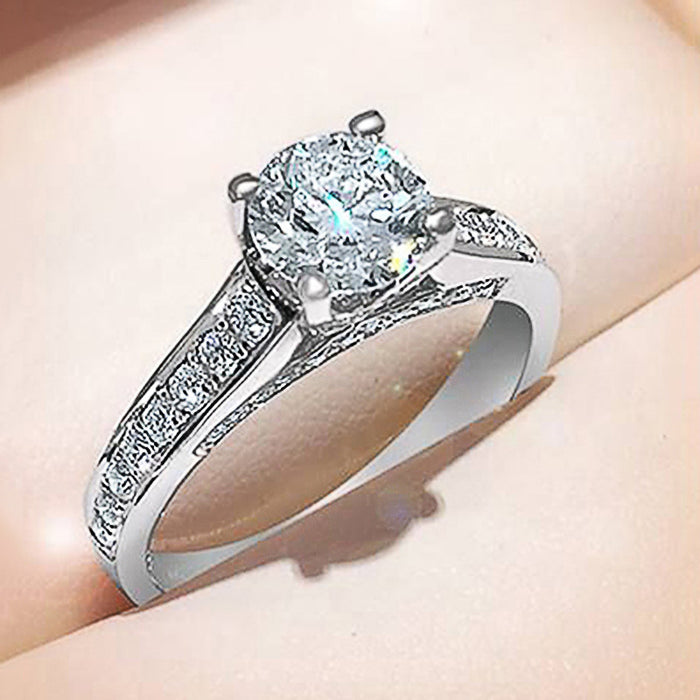 White gold plated zircon female ring, classic four-claw ring