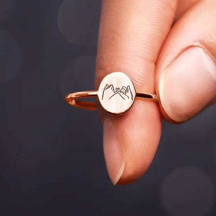 Women's geometric oval laser engraved ring