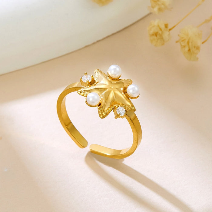 Wholesale five-pointed star-shaped openwork rings inlaid with diamonds and pearls
