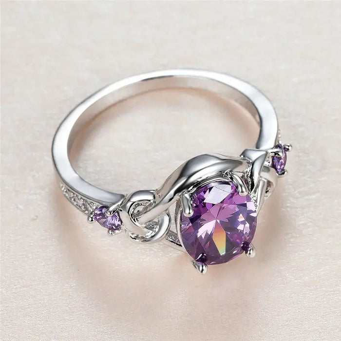 Anillo de princesa morado con incrustaciones Anillo de bobinado ovalado europeo y americano