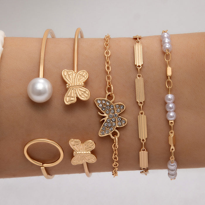 Conjunto de pulseras de cadena con forma de mariposa y perlas: cinco piezas de joyería con puños abiertos geométricos