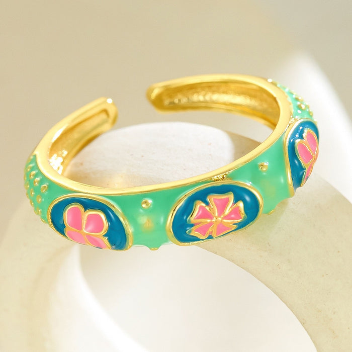 Wholesale dripping four-leaf clover open rings