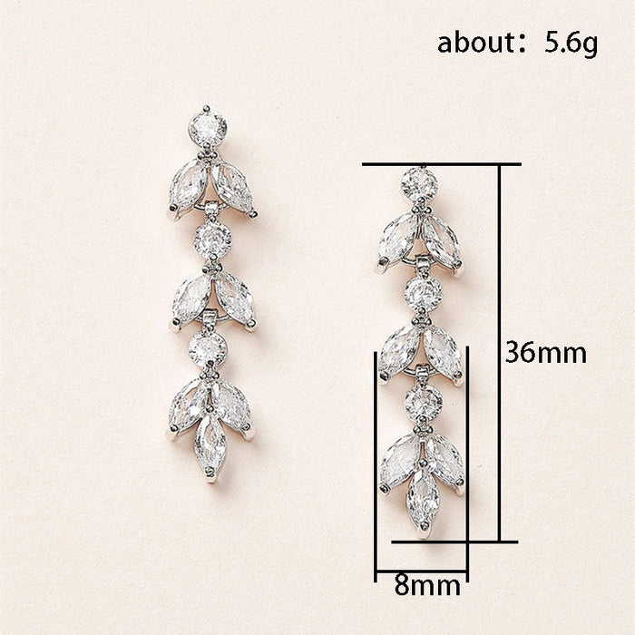 Diamond leaf tassel earrings