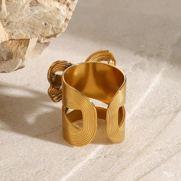 Stainless steel bow ring with diamonds