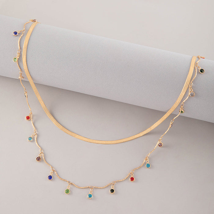 Collar de doble capa con piedras preciosas artificiales: elegante cadena de oro para mujer