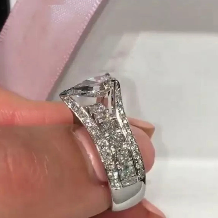 Anillo de diamantes simulados con circonita en forma de lágrima, anillo de bodas popular para mujeres