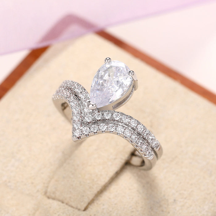 Anillo creativo en forma de lágrima con forma de pera y circonita, anillo femenino con corona