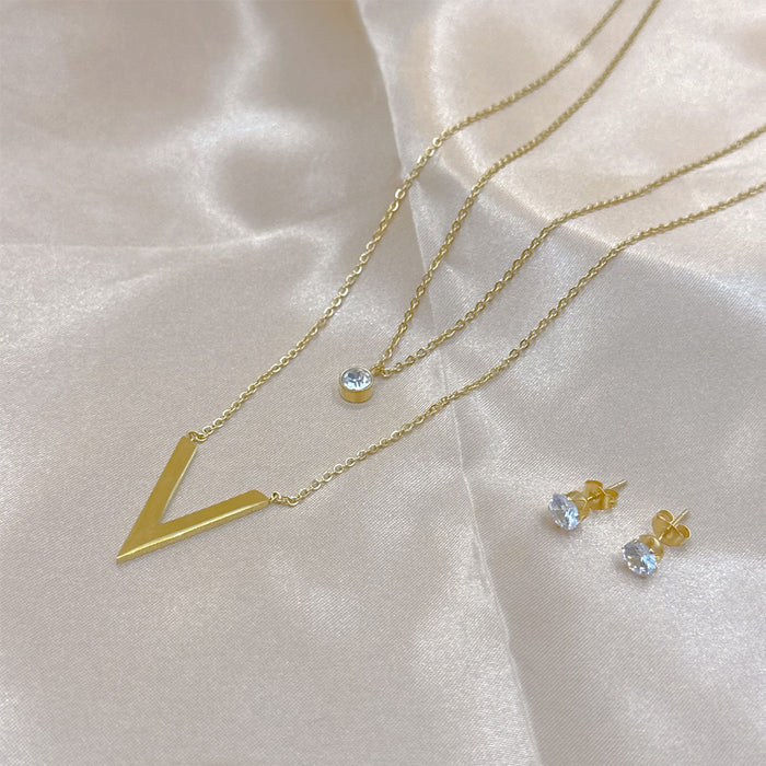 Aretes de acero inoxidable y titanio chapados en oro con forma de estrella al por mayor