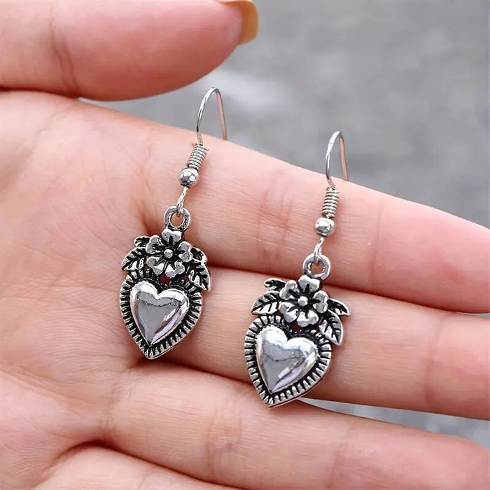 Pendientes retro transfronterizos Pendientes de flores de amor negras Ganchos para la oreja en forma de corazón europeos y americanos