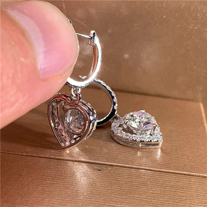 Hollow heart-shaped zircon earrings