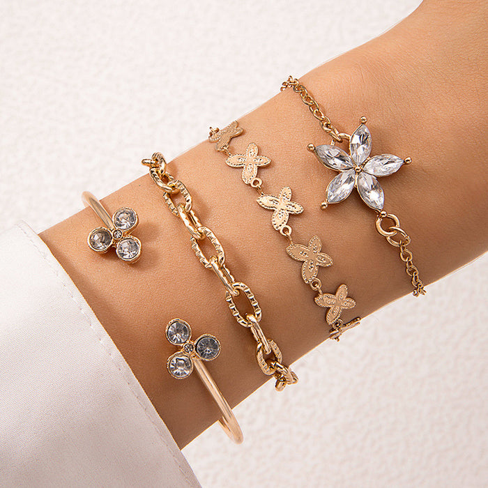 Elegante juego de pulseras con pétalos de diamantes de imitación: joyería de mariposa en capas de cuatro piezas para mujer