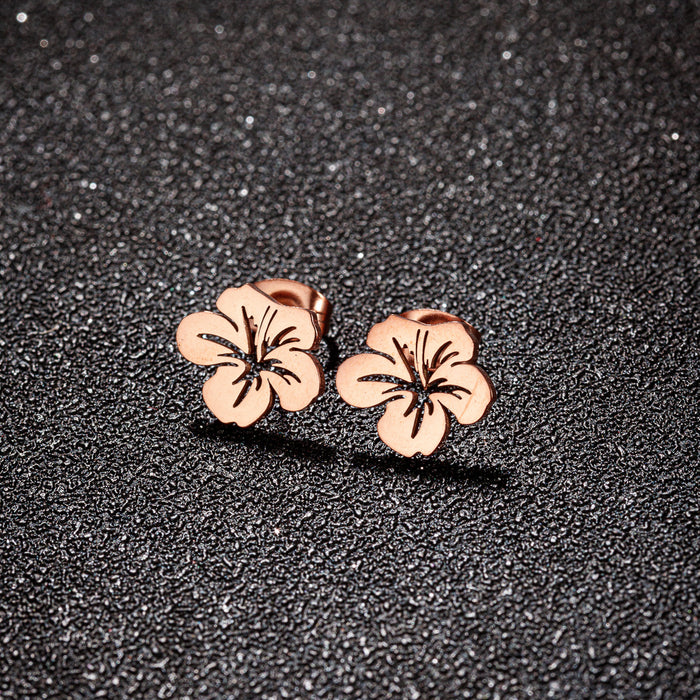 Flower earrings, cross-border new fashion temperament stainless steel hollow small fresh simple earrings wholesale