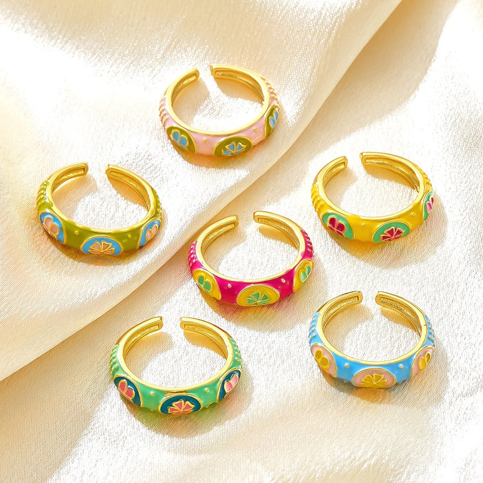 Wholesale dripping four-leaf clover open rings