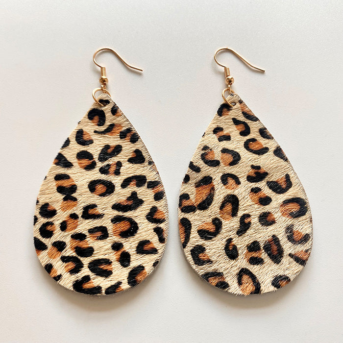 Pendientes de lágrima de cuero genuino con estampado de leopardo, diseño geométrico y de estrellas