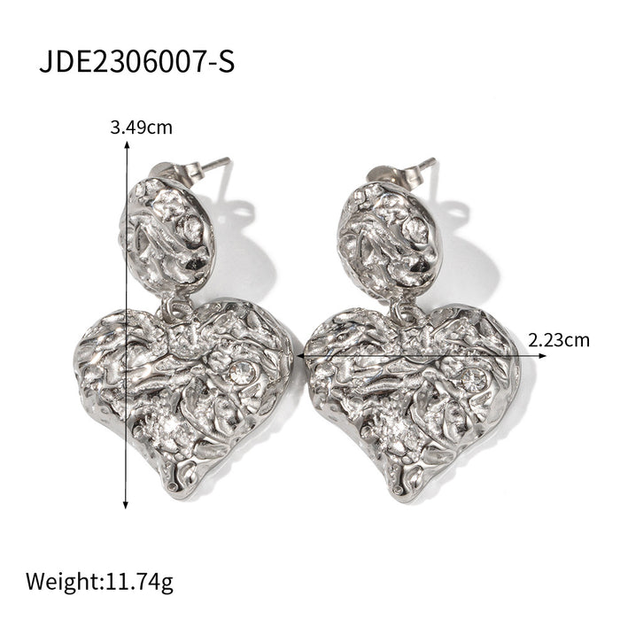 Pendientes colgantes de corazón de acero inoxidable y oro de 18 quilates: joyería de corazón forjado con lava y circonita