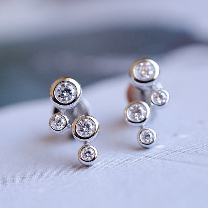 Geometric hoop ear bone studs for students