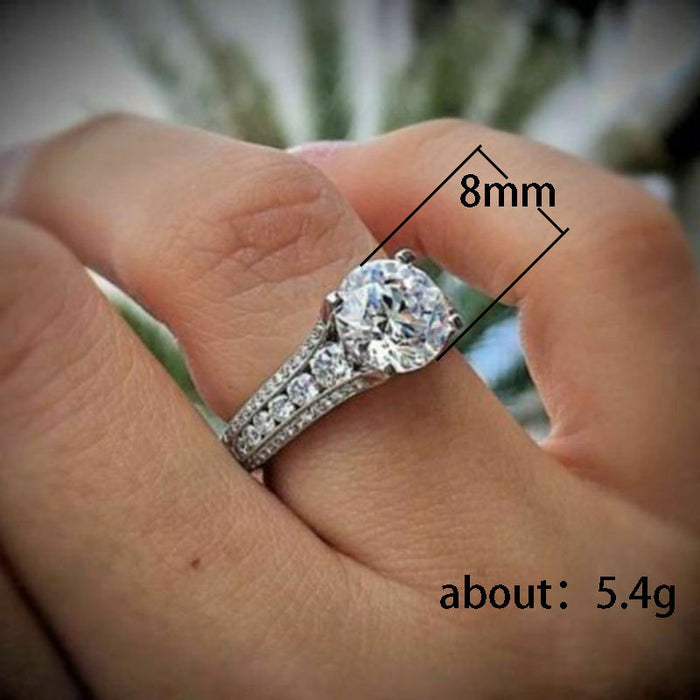 Classic four-claw round zirconium geometric ring, fashionable party match