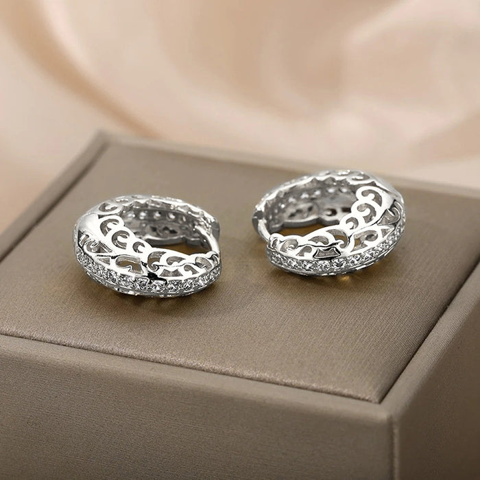 Hollow floral earrings with geometric shapes