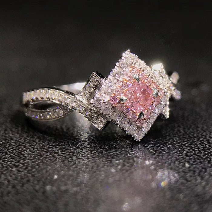 Anillo de diamantes rosas y circonitas en forma de cruz para mujer