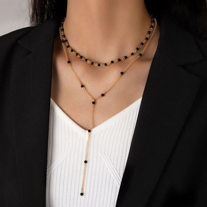 Elegant Pearl Necklace Set with Geometric Design