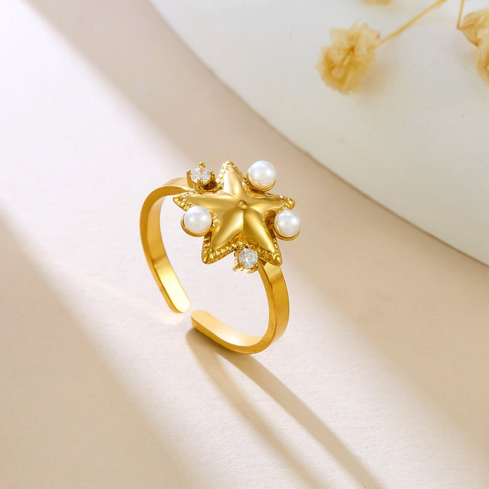 Wholesale five-pointed star-shaped openwork rings inlaid with diamonds and pearls