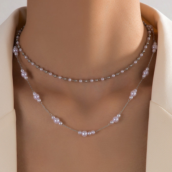 Double Layered Pearl and Metal Chain Necklace - Sophisticated and Trendy Design