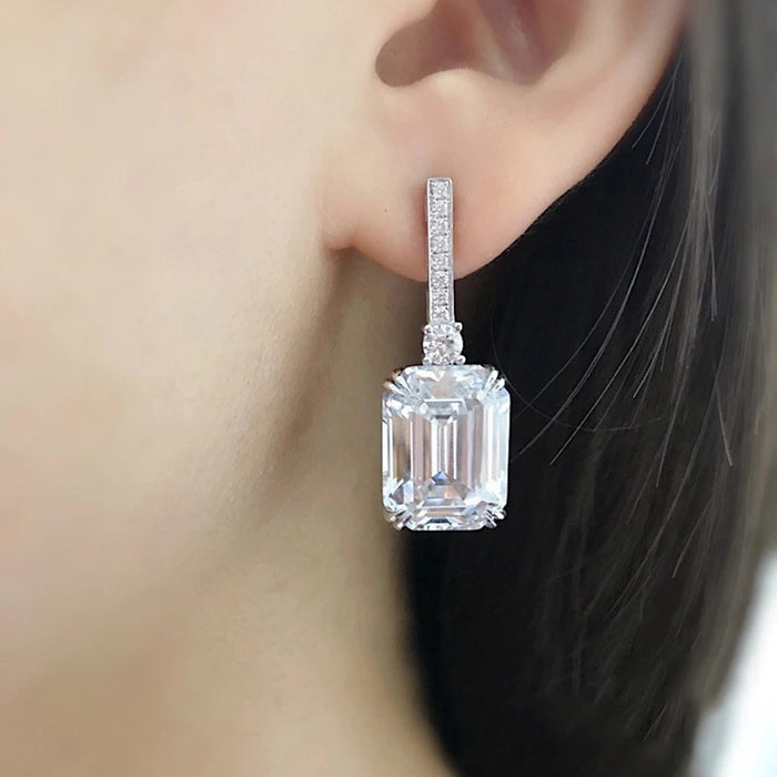 Pendientes de circonitas y diamantes para eventos empresariales