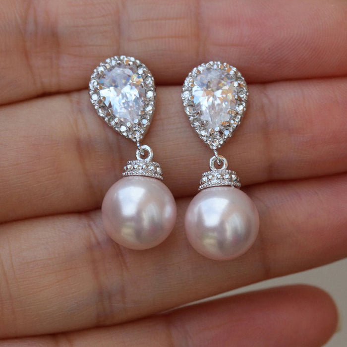 Pendientes en forma de corazón con diamantes rosas simulados