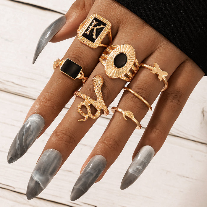 Dark gold letter K snake butterfly seven-piece ring set