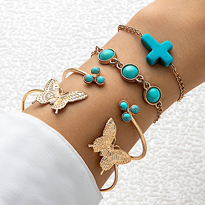 Conjunto de pulseras con cruz turquesa de Bohemia: brazalete abierto con diseño geométrico de mariposa