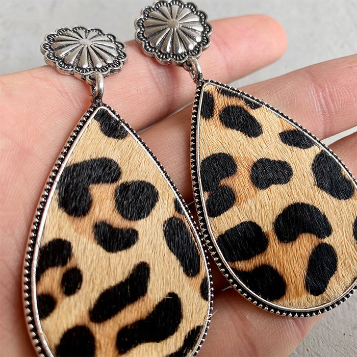 Pendientes de cuero con estampado animal occidental, estilo bohemio y diseño de flor de calabaza