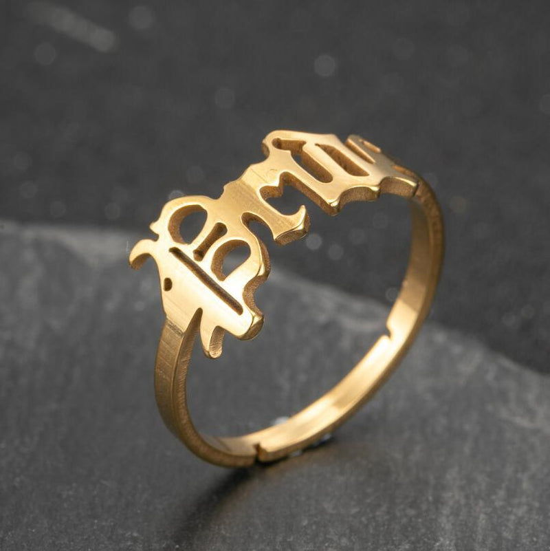 Anillo de acero inoxidable con letras retro, anillo Prince al por mayor