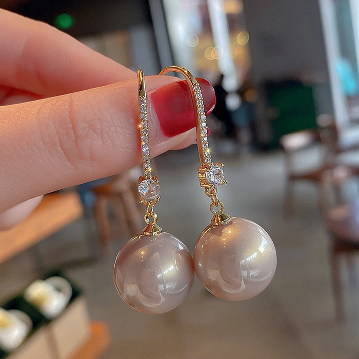 Pearl and zircon earrings